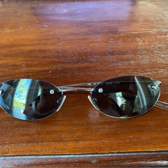 Gucci Silver Rimless Sunglasses - Picture 1 of 12